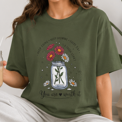 A four-panel collage showing an olive green graphic T-shirt worn by a model in different settings, plus a flat lay of the same shirt. The shirt features a mason jar design with flowers, a cross, and the text 'You are worth it'.