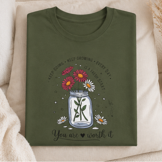 A four-panel collage showing an olive green graphic T-shirt worn by a model in different settings, plus a flat lay of the same shirt. The shirt features a mason jar design with flowers, a cross, and the text 'You are worth it'.